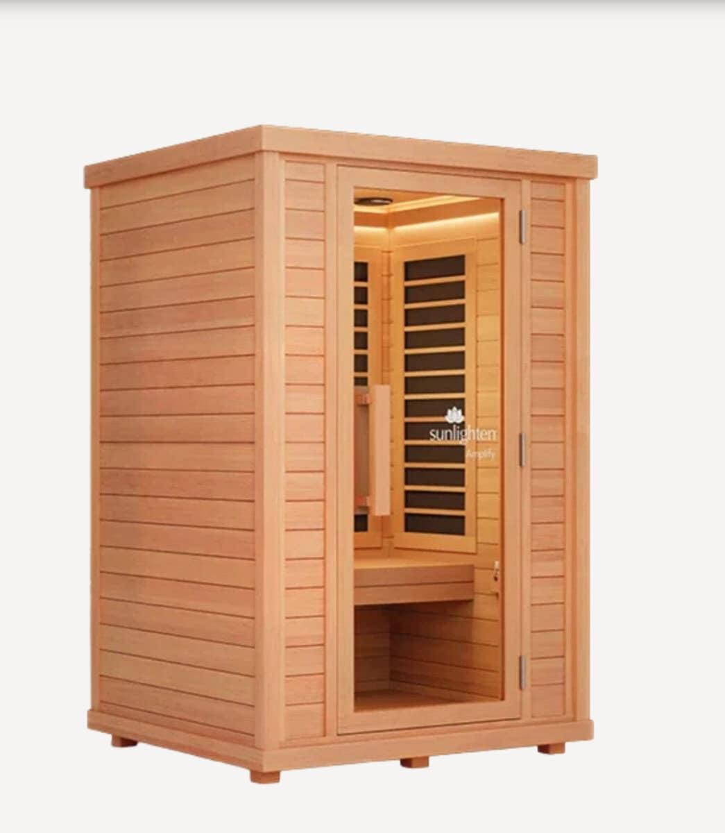 Sunlighten Amplify II 2-person full-spectrum infrared sauna cabin for premium home wellness use.
